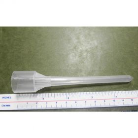 Plastic tip for pipettor next to ruler measuring approximately five inches.